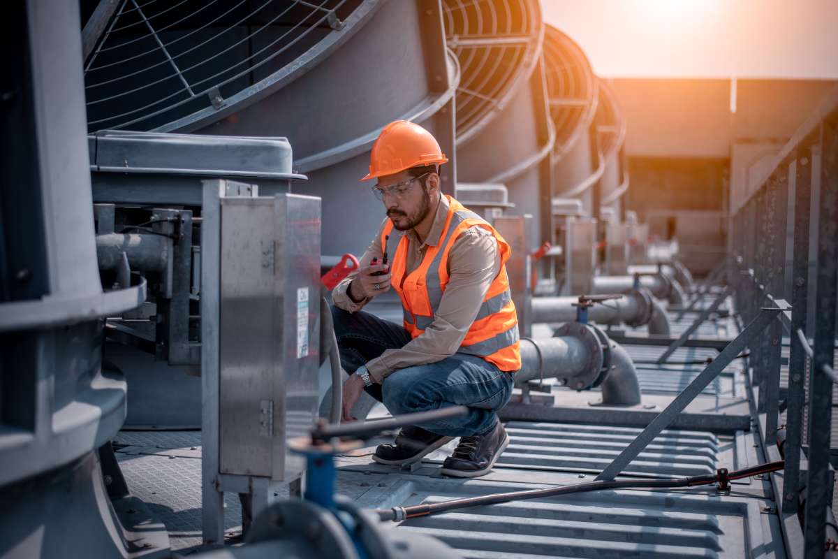 HVAC Repair Professional Working On Buildings HVAC System