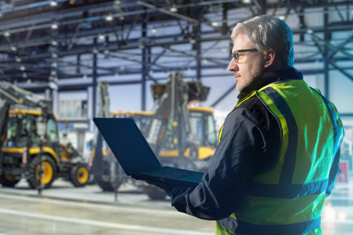 New Equipment Rental Company Owner Emailing His Industrial Services Sector M&A Advisor