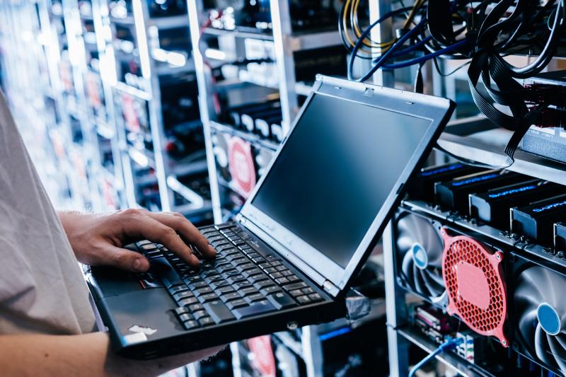 Cybersecurity Specialist Checking On Server Status